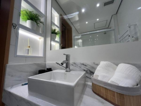 Flat Hotel Slaviero GRU 2 Quartos até 6p | Delfhy